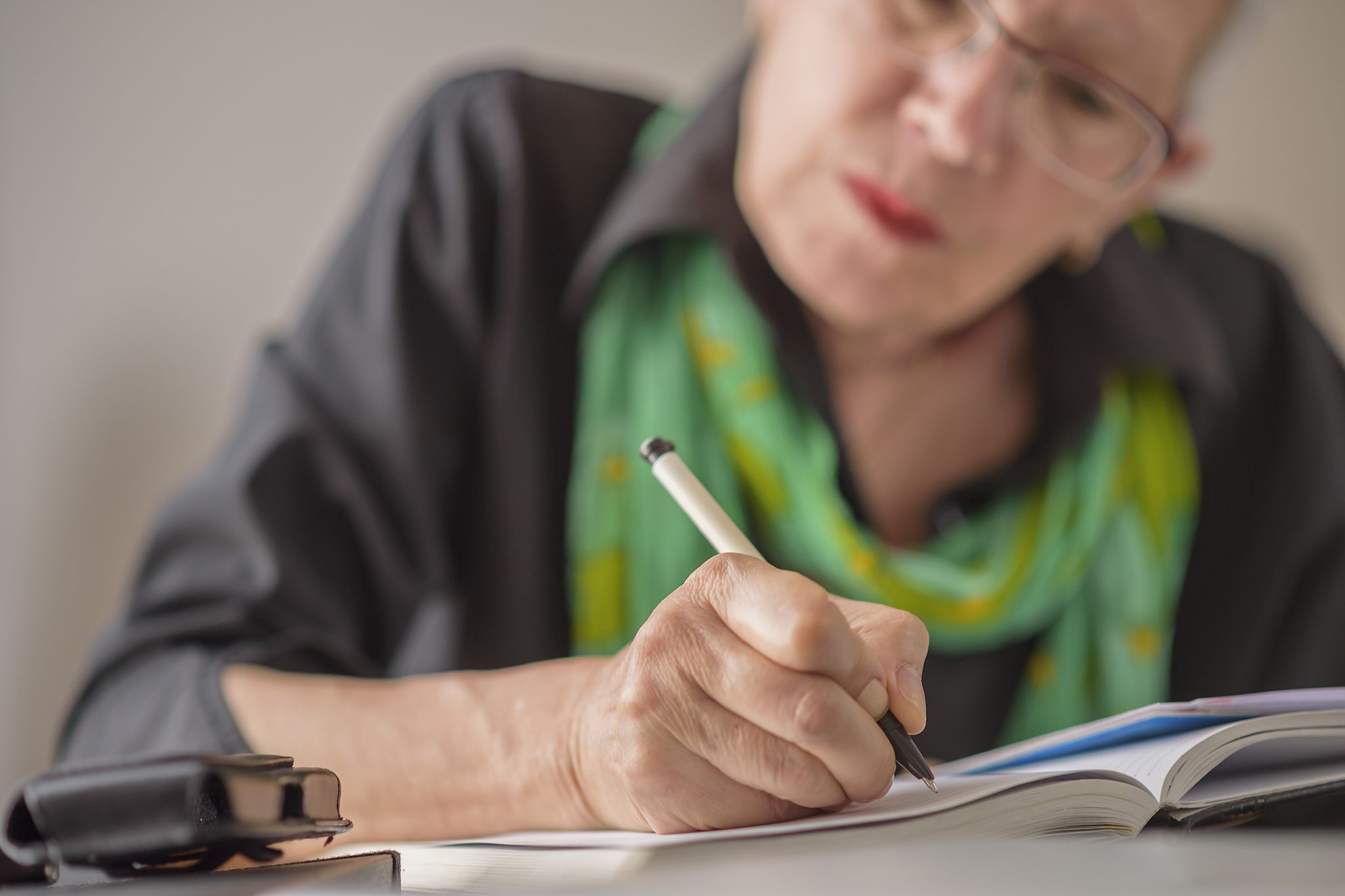 Woman writing legacy letter
