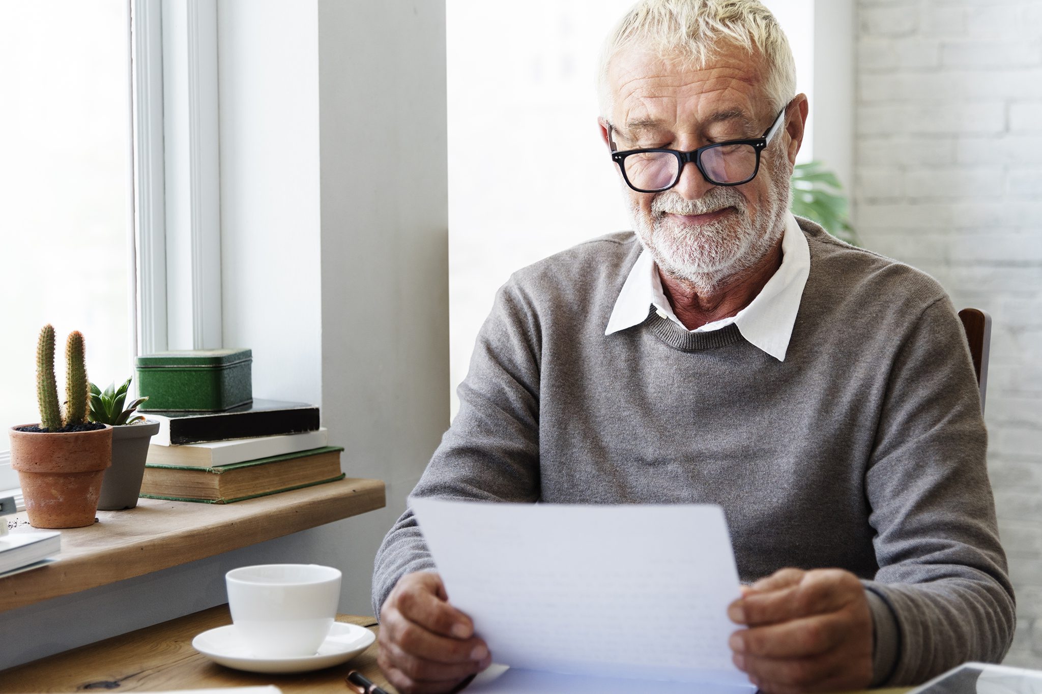 Man writing a legacy letter
